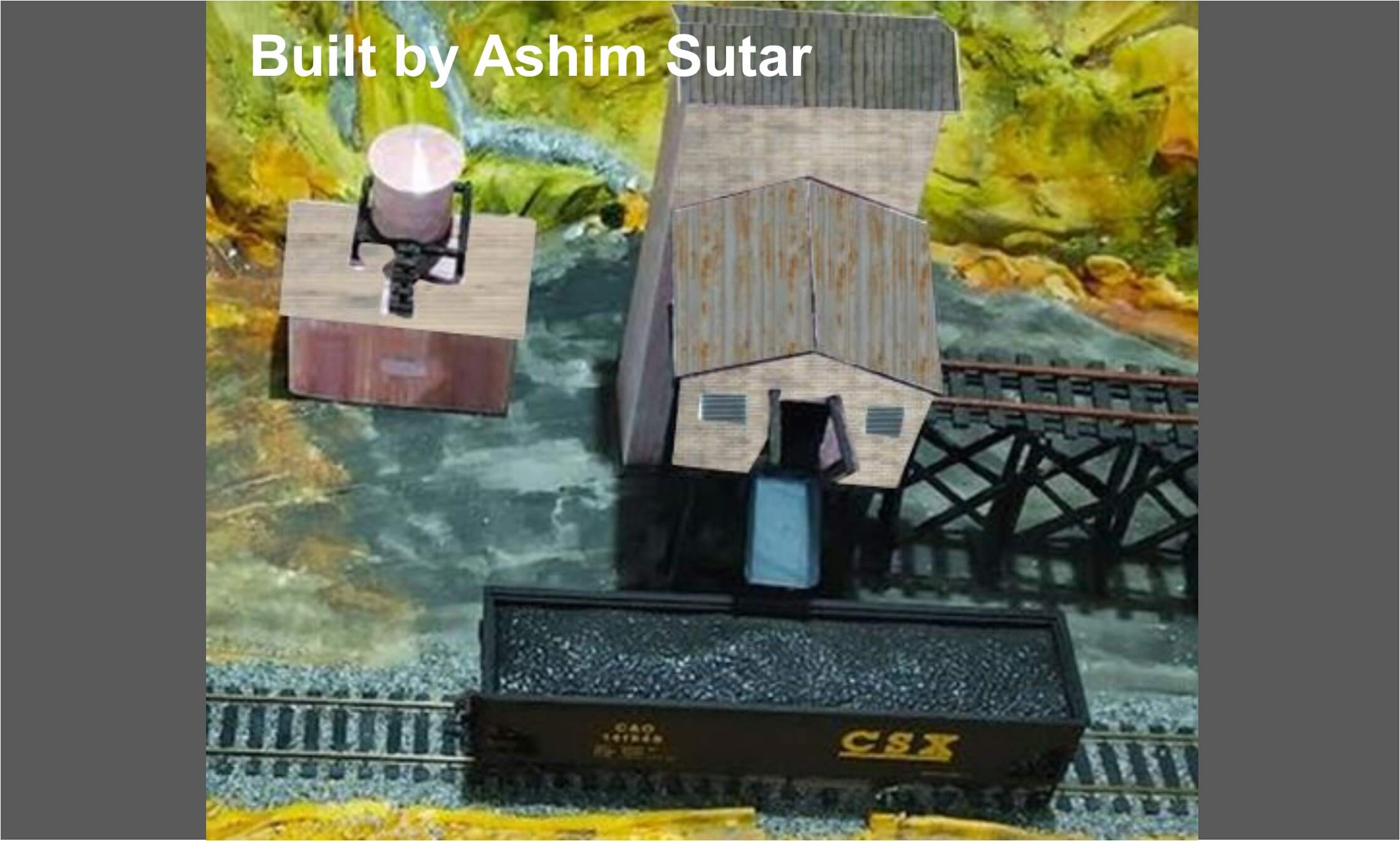 model-mine-structures-alongside-railway-track